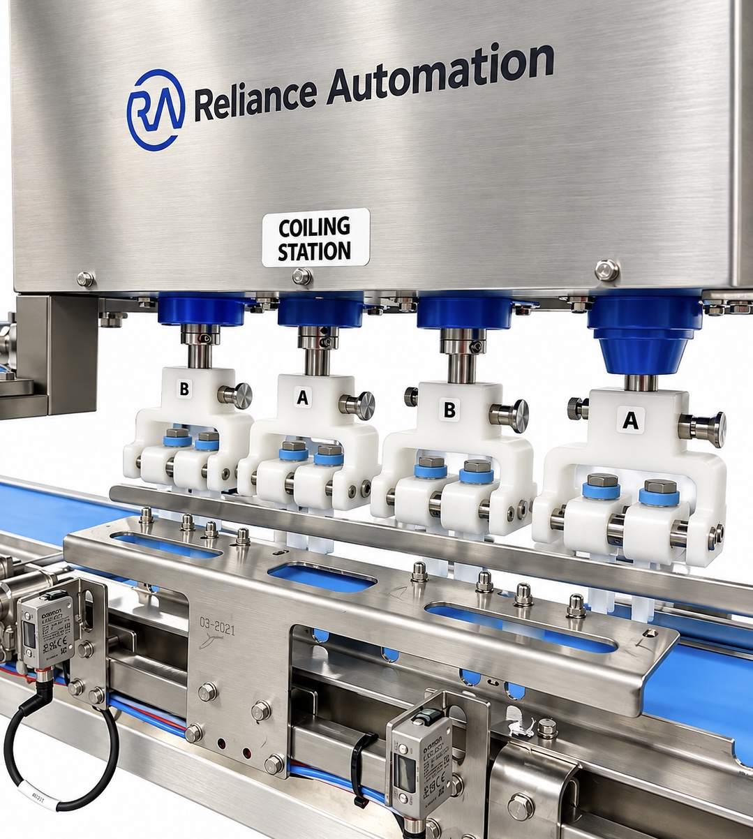 Close-up of the servo-controlled multi-head coiling station on the Reliance Automation packaging line